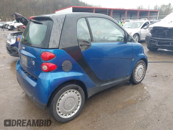 2009 Smart fortwo Pure with VIN WMEEJ31X69K312553, listed as a IAAI auction lot 41957660 with 156,476 mi miles. Bid and sale history available at carsss.com. Image 4.