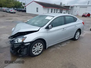 2019 Nissan Sentra S z VIN 3N1AB7AP7KY425276, wystawiony jako IAAI lot #41745256 z przebiegiem 72 306 mil mil oraz . Historia ofert i sprzedaży dostępna na DreamBid. Obrazek 18.