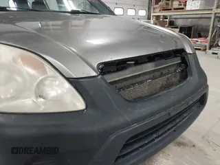 2006 Honda CR-V LX with VIN JHLRD785X6C053853, listed as a IAAI auction lot 42018895 with 246,316 mi miles and . Bid and sale history available at carsss.com. Image 6.