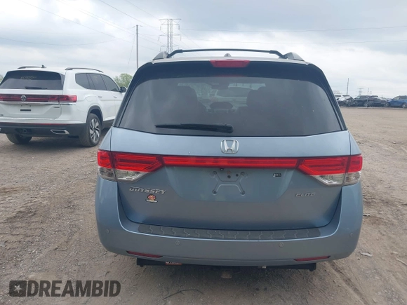 2014 Honda Odyssey Touring with VIN 5FNRL5H91EB081811, listed as a IAAI auction lot 42153920 with 16 mi miles and . Bid and sale history available at DreamBid. Image 16.
