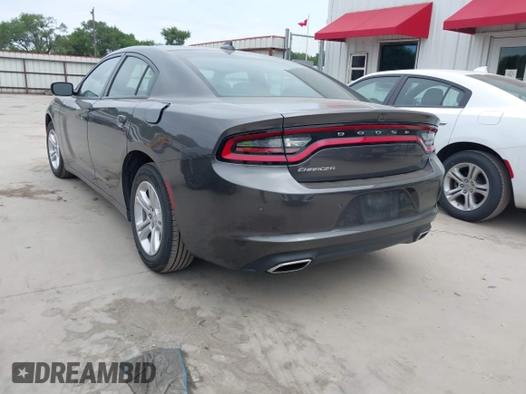 2023 Dodge Charger SXT with VIN 2C3CDXBG2PH530095, listed as a IAAI auction lot 42016658 with 50,528 mi miles and . Bid and sale history available at DreamBid. Image 3.