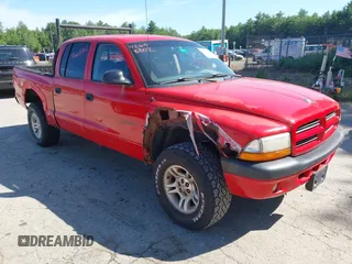 2001 Dodge Dakota Sport with VIN 1B7GG2AN11S208720, listed as a IAAI auction lot 42608802 with 143,792 mi miles and . Bid and sale history available at DreamBid. Image 1.
