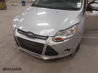 2012 Ford Focus SE with VIN 1FAHP3K26CL432308, listed as a IAAI auction lot 41854113 with 153,094 mi miles. Bid and sale history available at carsss.com. Image 6.