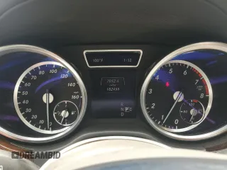 2014 Mercedes-Benz GL 450 z VIN 4JGDF7CE0EA303471, wystawiony jako Copart lot #58673045 z przebiegiem 182 455 mil mil oraz Tytuł czysty. Historia ofert i sprzedaży dostępna na DreamBid. Obrazek 9.