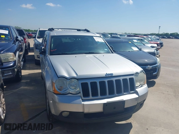 2010 Jeep Grand Cherokee Laredo with VIN 1J4PR4GK1AC143780, listed as a IAAI auction lot 42058575 with 88,608 mi miles. Bid and sale history available at carsss.com. Image 1.
