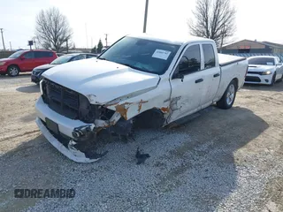 2018 Ram 1500 Tradesman with VIN 1C6RR7FT6JS328138, listed as a IAAI auction lot 41801702 with 119,230 mi miles and . Bid and sale history available at DreamBid. Image 2.