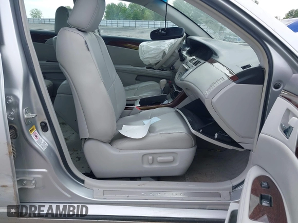 2010 Toyota Avalon XL with VIN 4T1BK3DB6AU369581, listed as a IAAI auction lot 42159063 with 137,996 mi miles and . Bid and sale history available at carsss.com. Image 5.