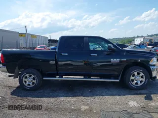 2018 Ram 2500 SLT with VIN 3C6TR5DT2JG166397, listed as a IAAI auction lot 42551256 with 100,040 mi miles and . Bid and sale history available at DreamBid. Image 14.
