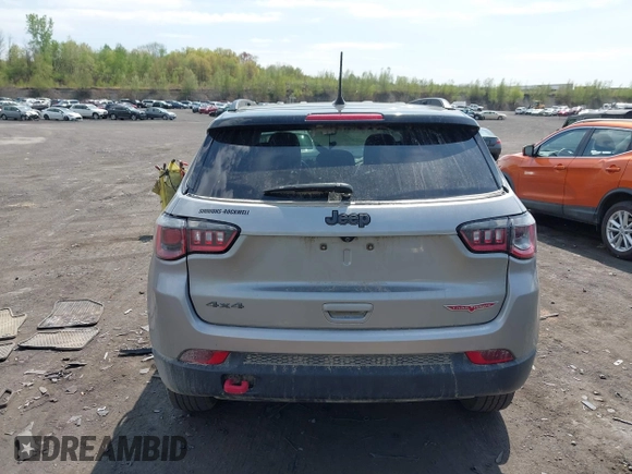 2020 Jeep Compass Trailhawk with VIN 3C4NJDDB4LT171685, listed as a IAAI auction lot 42168366 with 76,390 mi miles and . Bid and sale history available at DreamBid. Image 16.