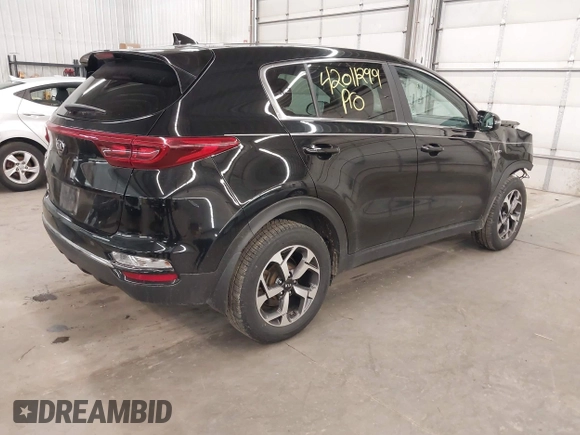 2020 Kia Sportage LX with VIN KNDPMCACXL7804797, listed as a IAAI auction lot 42011299 with 49,793 mi miles and . Bid and sale history available at carsss.com. Image 4.
