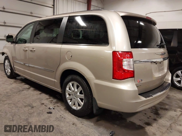 2014 Chrysler Town & Country Touring with VIN 2C4RC1BG3ER295722, listed as a IAAI auction lot 41705820 with 142,587 mi miles and . Bid and sale history available at DreamBid. Image 3.