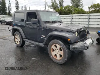 2009 Jeep Wrangler Sahara with VIN 1J4FA54109L702963, listed as a Copart auction lot 89211555 with 125,138 mi miles and Clean title. Bid and sale history available at DreamBid. Image 4.