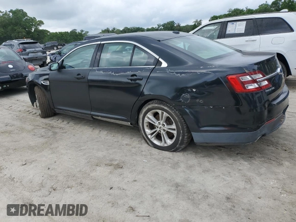 2015 Ford Taurus SE with VIN 1FAHP2D88FG136022, listed as a Copart auction lot 50944035 with 221,164 mi miles and Salvage Title. Bid and sale history available at DreamBid. Image 2.