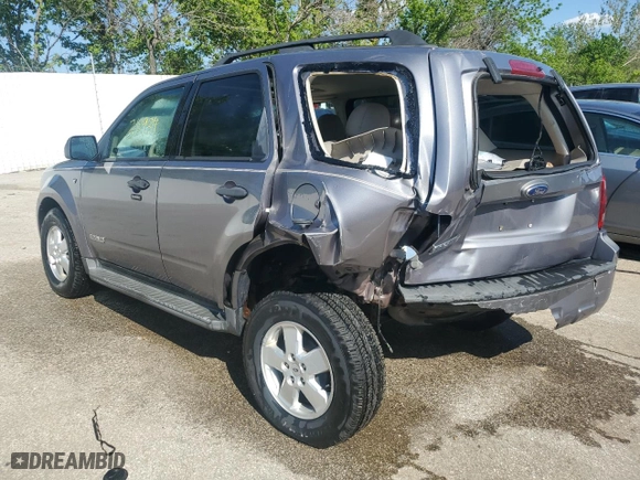 2008 Ford Escape XLT with VIN 1FMCU031X8KA77833, listed as a Copart auction lot 52677714 with 218,934 mi miles and Non Repairable. Bid and sale history available at carsss.com. Image 2.