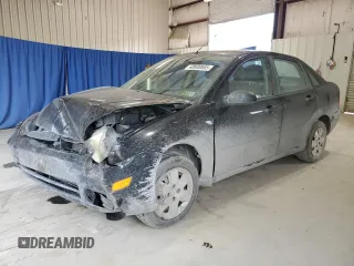 2006 Ford Focus S with VIN 1FAFP34N26W244239, listed as a Copart auction lot 60848665 with 94,579 mi miles and Salvage title. Bid and sale history available at DreamBid. Image 1.