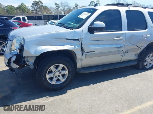 2014 GMC Yukon SLT with VIN 1GKS1CE04ER121301, listed as a IAAI auction lot 41825056 with 141,562 mi miles. Bid and sale history available at carsss.com. Image 6.