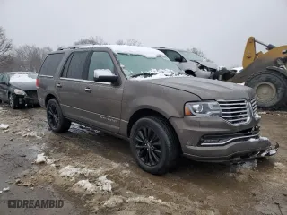 2015 Lincoln Navigator with VIN 5LMJJ2JT7FEJ14653, listed as a Copart auction lot 44921315 with 112,183 mi miles and Salvage Title. Bid and sale history available at carsss.com. Image 4.