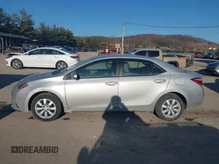 2016 Toyota Corolla L z VIN 5YFBURHE9GP566742, wystawiony jako IAAI lot #41771845 z przebiegiem 130 601 mil mil oraz . Historia ofert i sprzedaży dostępna na DreamBid. Obrazek 14.