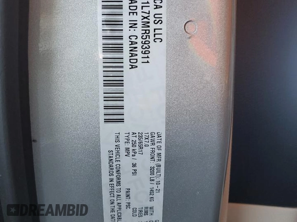 2021 Chrysler Pacifica Hybrid Touring L with VIN 2C4RC1L7XMR593911, listed as a Copart auction lot 57842415 with 74,910 mi miles and Salvage title. Bid and sale history available at DreamBid. Image 13.