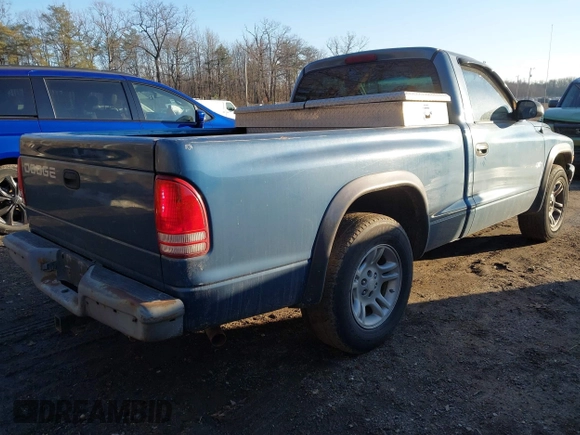 2002 Dodge Dakota with VIN 1B7FL16X92S663618, listed as a IAAI auction lot 41441241 with 314,122 mi miles and . Bid and sale history available at carsss.com. Image 4.