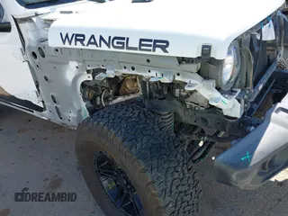 2020 Jeep Wrangler Unlimited Sport with VIN 1C4HJXDG0LW174393, listed as a IAAI auction lot 41575040 with 68,418 mi miles and . Bid and sale history available at DreamBid. Image 6.