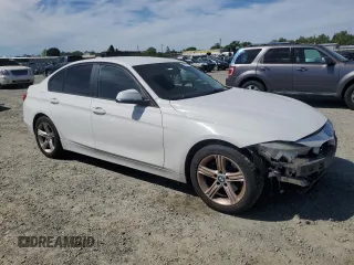 2015 BMW 3 Series 320i with VIN WBA3B1C52FK136581, listed as a Copart auction lot 52803405 with 138,495 mi miles and Salvage Title. Bid and sale history available at carsss.com. Image 4.