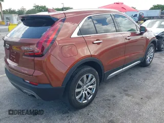 2019 Cadillac XT4 FWD Premium Luxury with VIN 1GYFZCR41KF183507, listed as a IAAI auction lot 41987176 with 64,803 mi miles and . Bid and sale history available at carsss.com. Image 4.