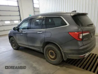 2019 Honda Pilot Touring 8-Passenger z VIN 5FNYF6H93KB502528, wystawiony jako Copart lot #51811045 z przebiegiem 157 204 mil mil oraz Czysty tytuł • Clean title. Historia ofert i sprzedaży dostępna na DreamBid. Obrazek 2.