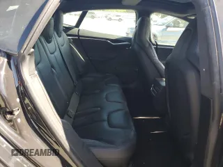 2016 Tesla Model S 90D with VIN 5YJSA1E2XGF129106, listed as a Copart auction lot 59162185 with 136,004 mi miles and Salvage title. Bid and sale history available at DreamBid. Image 10.