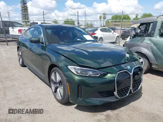 2023 BMW i4 eDrive40 z VIN WBY73AW00PFN91715, wystawiony jako IAAI lot #41946729 z przebiegiem 16 506 mil mil oraz . Historia ofert i sprzedaży dostępna na DreamBid. Obrazek 1.
