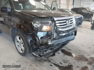 2014 Honda Pilot EX-L with VIN 5FNYF4H51EB005726, listed as a IAAI auction lot 40998416 with 147,482 mi miles. Bid and sale history available at carsss.com. Image 6.