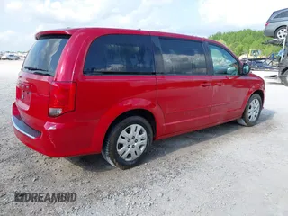 2014 Dodge Grand Caravan American Value with VIN 2C4RDGBG6ER309449, listed as a IAAI auction lot 42148824 with 198,532 mi miles and . Bid and sale history available at DreamBid. Image 4.