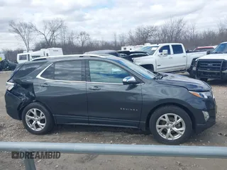 2018 Chevrolet Equinox Premier with VIN 2GNAXVEVXJ6188205, listed as a IAAI auction lot 42028868 with 93,828 mi miles and . Bid and sale history available at DreamBid. Image 13.
