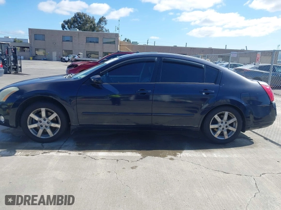2004 Nissan Maxima SL with VIN 1N4BA41E64C861846, listed as a IAAI auction lot 41911687 with 218,668 mi miles. Bid and sale history available at carsss.com. Image 14.
