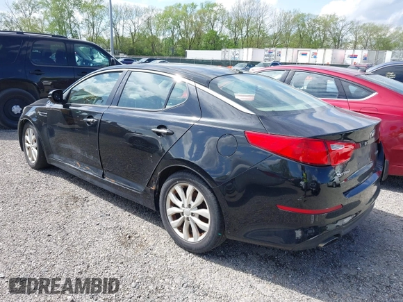 2014 Kia Optima EX z VIN 5XXGN4A71EG340220, wystawiony jako IAAI lot #42176989 z przebiegiem 177 064 mil mil oraz . Historia ofert i sprzedaży dostępna na DreamBid. Obrazek 3.