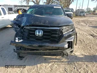 2023 Honda Pilot Touring with VIN 5FNYG2H77PB006594, listed as a Copart auction lot 83662854 with 37,637 mi miles and Salvage Title. Bid and sale history available at DreamBid. Image 12.
