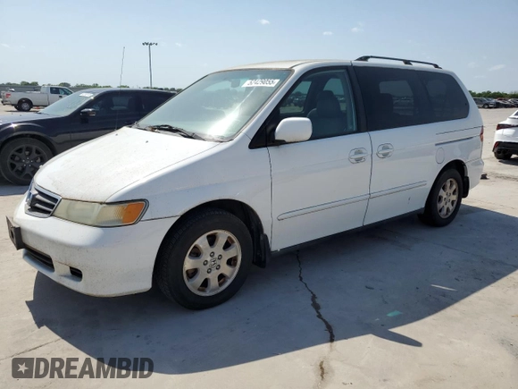 2004 Honda Odyssey EX-L with VIN 5FNRL18974B092979, listed as a Copart auction lot 52429055 with 106,515 mi miles and Clean Title. Bid and sale history available at DreamBid. Image 1.