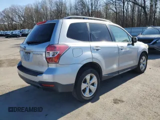 2014 Subaru Forester Premium z VIN JF2SJAGC8EH451747, wystawiony jako Copart lot #51383695 z przebiegiem 104 085 mil mil oraz Szkoda całkowita • Salvage title. Historia ofert i sprzedaży dostępna na DreamBid. Obrazek 3.