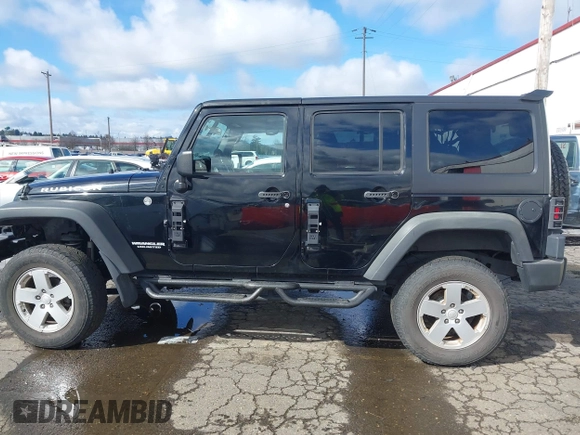 2011 Jeep Wrangler Unlimited Rubicon with VIN 1J4BA6H13BL513311, listed as a IAAI auction lot 41809207 with 124,716 mi miles and . Bid and sale history available at DreamBid. Image 14.