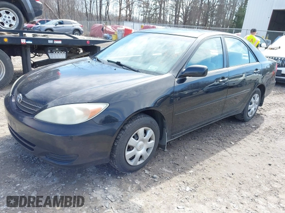 2004 Toyota Camry LE with VIN 4T1BE32K94U307994, listed as a IAAI auction lot 41847450 with 164,016 mi miles and . Bid and sale history available at carsss.com. Image 2.