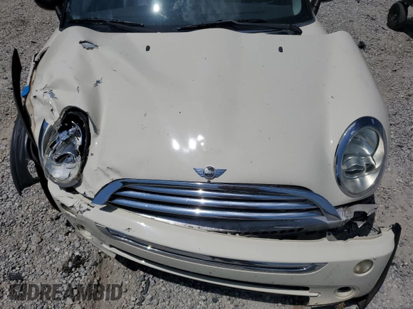 2006 MINI Hardtop с VIN WMWRC33516TK70432, выставлен на аукционе Copart как лот 62157605 с пробегом 139 823 миль миль и Списание • Salvage title. История ставок и продаж доступна на DreamBid. Изображение 11.