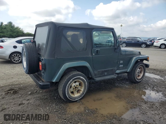 2003 Jeep Wrangler Sahara with VIN 1J4FA59S73P308250, listed as a Copart auction lot 64305965 with 186,288 mi miles and Clean title. Bid and sale history available at DreamBid. Image 3.