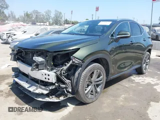 2023 Lexus NX 450h+ Luxury with VIN JTJHKCFZ0P2017929, listed as a IAAI auction lot 42282635 with 18,611 mi miles and . Bid and sale history available at DreamBid. Image 2.