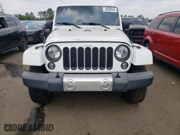 2015 Jeep Wrangler Unlimited Sahara z VIN 1C4BJWEG6FL627890, wystawiony jako Copart lot #58080945 z przebiegiem 145 941 mil mil oraz Szkoda całkowita • Salvage title. Historia ofert i sprzedaży dostępna na DreamBid. Obrazek 5.