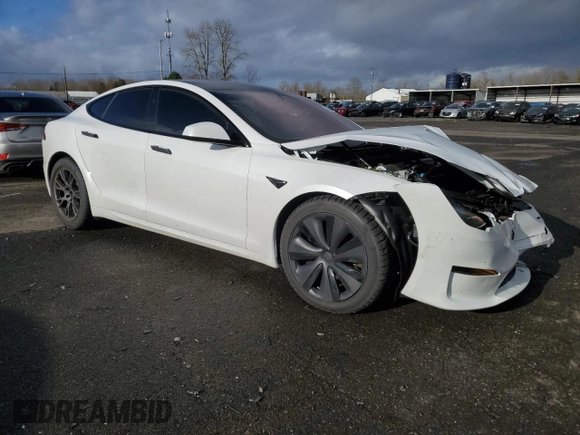 2024 Tesla Model S с VIN 5YJSA1E59RF541014, выставлен на аукционе Copart как лот 86646114 с пробегом 7 404 миль миль и Списание • Salvage title. История ставок и продаж доступна на DreamBid. Изображение 4.
