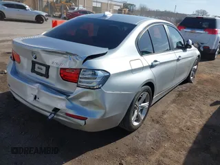 2014 BMW 3 Series 320i with VIN WBA3B1G58ENS81101, listed as a IAAI auction lot 38950717 with 1 mi miles. Bid and sale history available at carsss.com. Image 4.