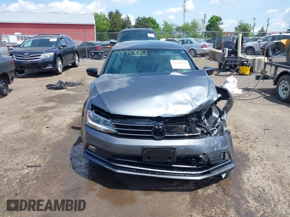 2016 Volkswagen Jetta Sport z VIN 3VWD17AJ9GM376294, wystawiony jako IAAI lot #42141450 z przebiegiem 139 030 mil mil oraz . Historia ofert i sprzedaży dostępna na DreamBid. Obrazek 13.