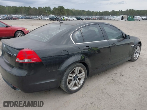2009 Pontiac G8 with VIN 6G2ER57789L232134, listed as a IAAI auction lot 41864803 with 166,717 mi miles. Bid and sale history available at carsss.com. Image 4.