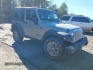2016 Jeep Wrangler Rubicon z VIN 1C4BJWCGXGL307542, wystawiony jako IAAI lot #41407411 z przebiegiem 124 749 mil mil oraz . Historia ofert i sprzedaży dostępna na DreamBid. Obrazek 1.