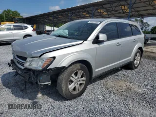 2012 Dodge Journey SXT with VIN 3C4PDCBB9CT331198, listed as a Copart auction lot 59922705 with 180,228 mi miles and Salvage title. Bid and sale history available at DreamBid. Image 1.